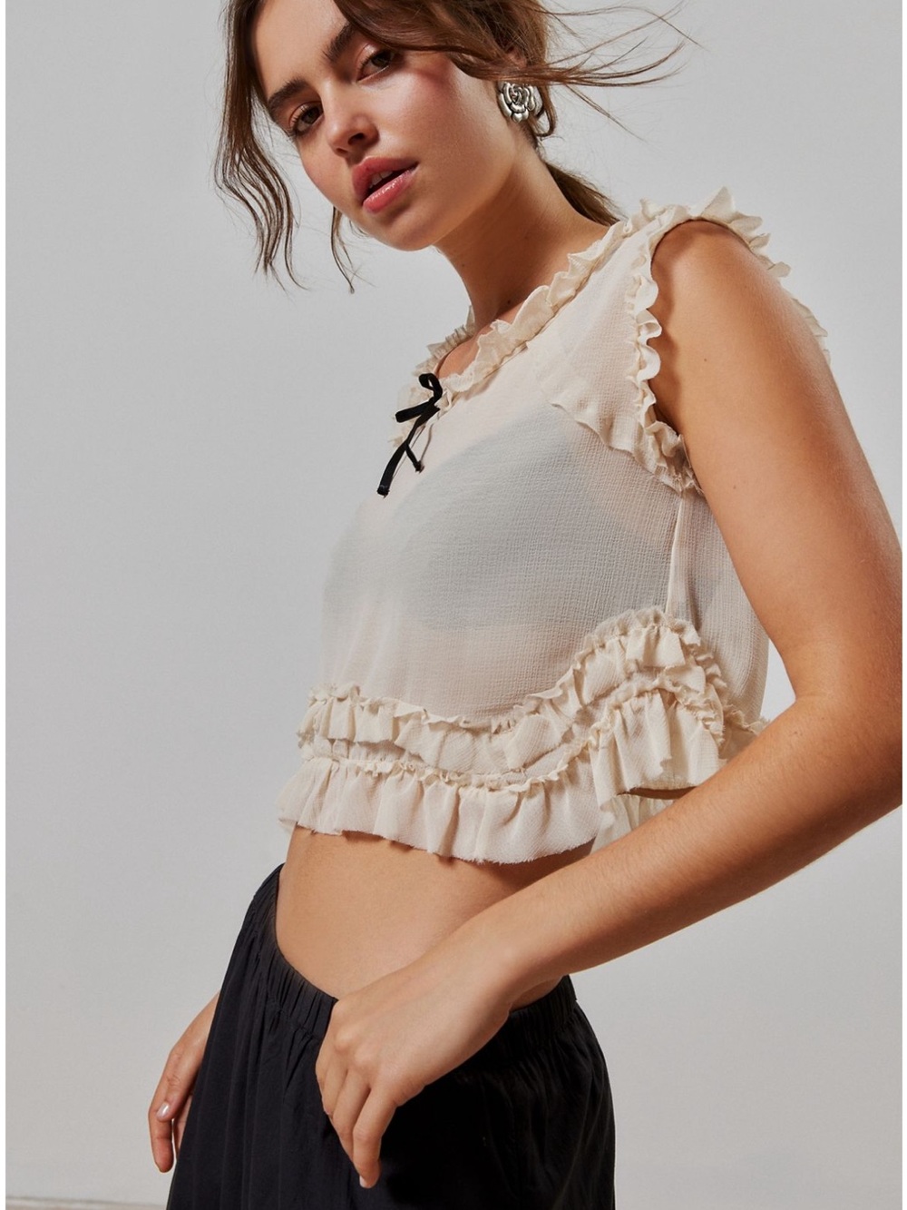 Kimchi Blue Cream Ruffled Sleeveless Crop Top with Black Bow